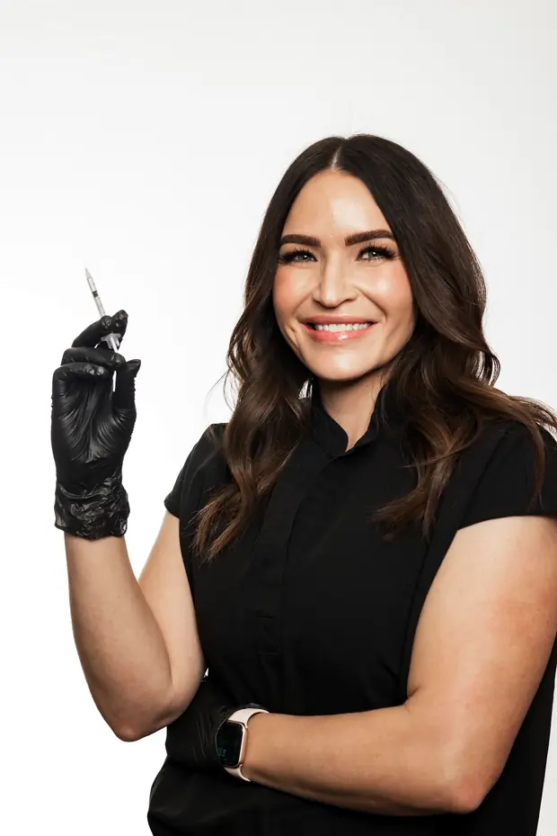 A Mason Aesthetics & Wellness clinician preparing an injectable treatment